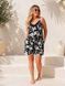 Жіночий костюм з шортами та майкою з квітковим принтом г767-1044 фото